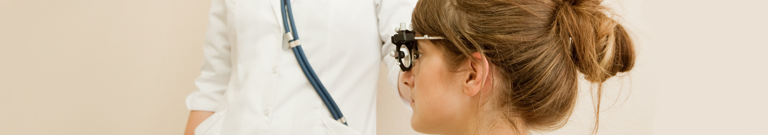 ophthalmologist  and patient testing  eyesight  in clinic